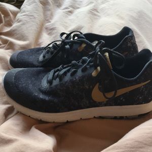 Black and grey Nike shoes